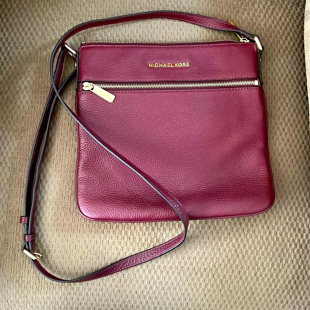 Never used leather Michael Kord crossbody messenger bag